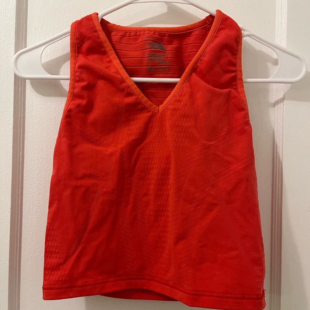Pink/red North Face size medium athletic top
